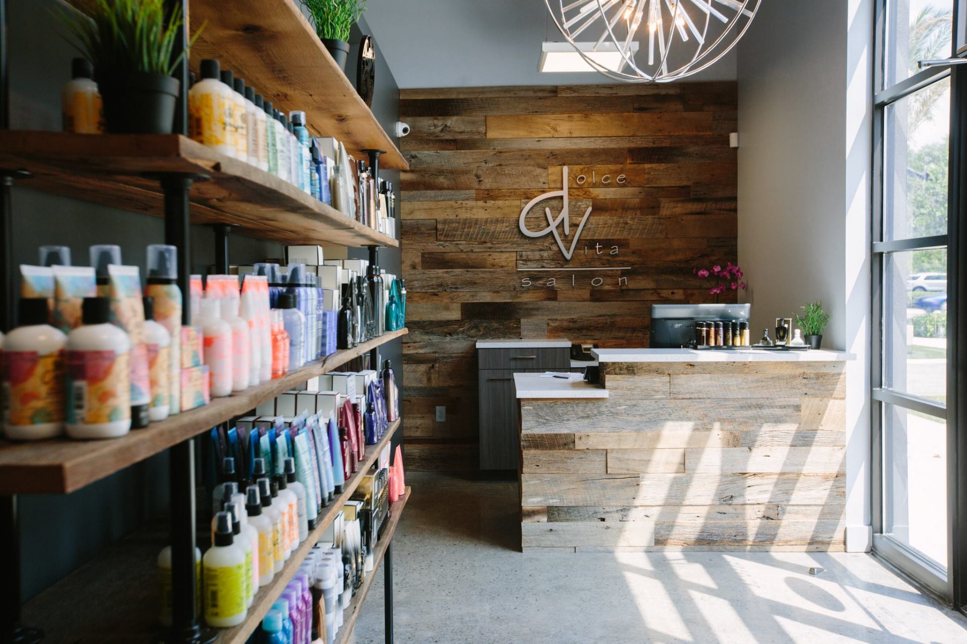 Dolce Vita Salons — reception desk and product retail display
